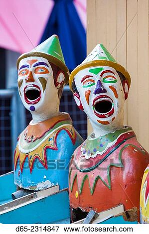 Australia, South Australia, Adelaide, Rundle Park, The Garden of Unearthly Delights, clown heads at water gun concession. View Large Photo Image Stock Photo - Australia, South Australia, Adelaide, Rundle Park, The Garden of Unearthly Delights, clown heads at water gun concession.. Fotosearch