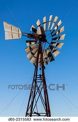 Stock Image - Australia, South Australia, Clare Valley, Clare, vineyard windmill.. Fotosearch