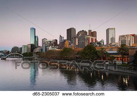 Australia, Victoria, VIC, Melbourne, skyline along the Yarra River towards Rialto Towers, elevated view, dawn. View Large Photo Image Stock Photo - Australia, Victoria, VIC, Melbourne, skyline along the Yarra River towards Rialto Towers, elevated view, dawn.. Fotosearch