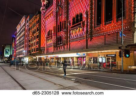 Stock Photo - Australia, Victoria, VIC, Melbourne, White Nights Festival, buildings lit with projected laser designs, Forum Theater, Flinders Street.. Fotosearch