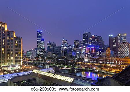 Australia, Victoria, VIC, Melbourne, skyline along the Yarra River towards Rialto Towers, elevated view, dusk. View Large Photo Image Stock Photography - Australia, Victoria, VIC, Melbourne, skyline along the Yarra River towards Rialto Towers, elevated view, dusk.. Fotosearch