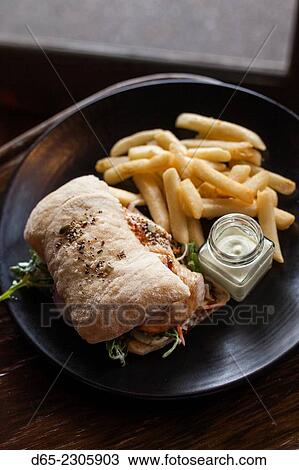 Australia, Victoria, VIC, Yarra Valley, Coldstream, Coldstream Brewery, grilled salmon panini with aioli and pommes frittes. View Large Photo Image Stock Image - Australia, Victoria, VIC, Yarra Valley, Coldstream, Coldstream Brewery, grilled salmon panini with aioli and pommes frittes.. Fotosearch
