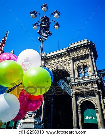 Balloons and entrance of Galleria Vittorio Emanuele II shopping arcade Milan Lombardy Italy. View Large Photo Image Stock Photo - Balloons and entrance of Galleria Vittorio Emanuele II shopping arcade Milan Lombardy Italy.. Fotosearch