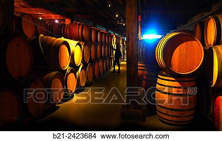 Picture - Beers aging cellar in barrels, Cantillon Brewery (Brasserie-Brouwerij Cantillon) is a small Belgian traditional family brewery based in Anderlecht, Brussels and founded in 1900, Belgium. Fotosearch