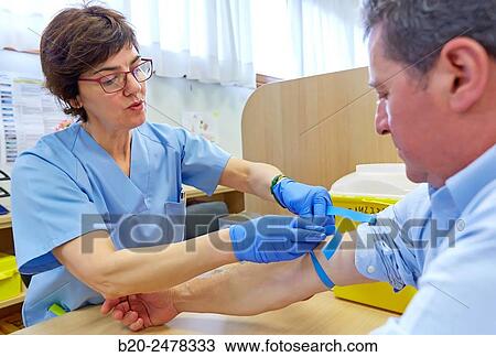 Stock Image - Blood collection, Nursing room, Medical consultation, Ambulatory Lezo, Gipuzkoa, Basque Country, Spain. Fotosearch