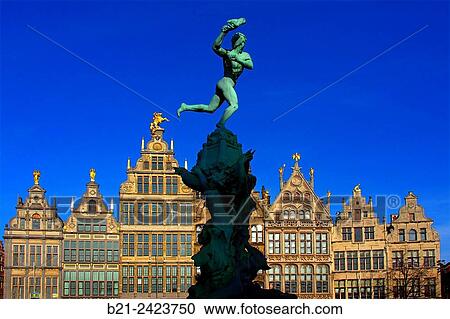 Stock Image - Brabo fountain and corporations houses on Grand Place, Antwerp, Belgium. Fotosearch