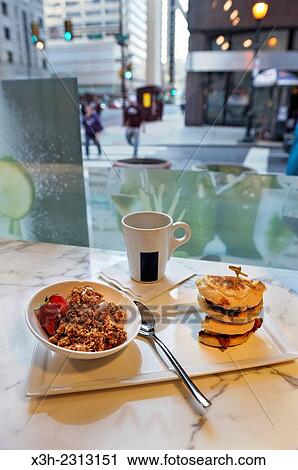 Stock Image - BreakfastYogurt Granola Parfaits and Ham, Egg & Cheddar, Philadelphia, Commonwealth of Pennsylvania, Northeastern United States,.. Fotosearch