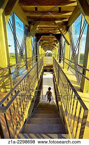 Cantilevered observation deck at the Ataria Interpretation Centre, Salburua wetlands park. Vitoria-Gasteiz. Alava province. Basque Country. Spain. View Large Photo Image Stock Photo - Cantilevered observation deck at the Ataria Interpretation Centre, Salburua wetlands park. Vitoria-Gasteiz. Alava province. Basque Country. Spain.. Fotosearch