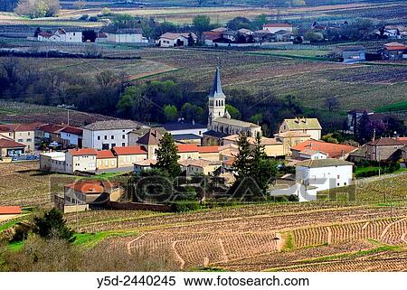 Chenas - small town surrounded by beaujolais vineyards, early spring, Chenas is also name of appellation of red wines in Northern Beaujolais, Rh? ne department, Rh? ne-Alpes, France. View Large Photo Image Stock Photography - Chenas - small town surrounded by beaujolais vineyards, early spring, Chenas is also name of appellation of red wines in Northern Beaujolais, Rh? ne department, Rh? ne-Alpes, France.. Fotosearch