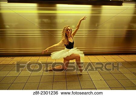 Classic ballerina with tutu dancing in the New York Subway. Classic ballerina with tutu dancing in the New York Subway. View Large Photo Image Stock Photograph - Classic ballerina with tutu dancing in the New York Subway. Classic ballerina with tutu dancing in the New York Subway.. Fotosearch