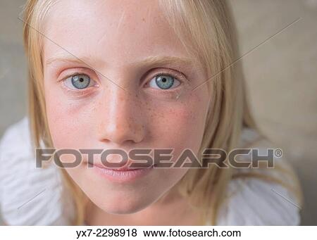 Close up of a young blond girl. View Large Photo Image Stock Photo - Close up of a young blond girl.. Fotosearch