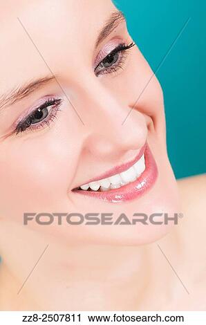 Closeup of a beautiful young woman smiling with healthy white teeth. View Large Photo Image Stock Image - Closeup of a beautiful young woman smiling with healthy white teeth.. Fotosearch