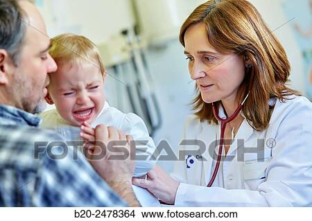 Consultation pediatrics, pediatrician Father and daughter, Medical consultation, Ambulatory Lezo, Gipuzkoa, Basque Country, Spain View Large Photo Image Picture - Consultation pediatrics, pediatrician Father and daughter, Medical consultation, Ambulatory Lezo, Gipuzkoa, Basque Country, Spain. Fotosearch