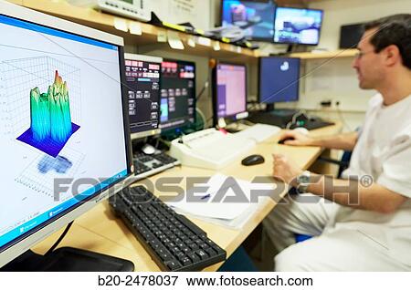 Stock Photo - Control screens, Linear Particle Accelerator, Radiotherapy, Treatment of cancer, Hospital Donostia, San Sebastian, Gipuzkoa, Basque Country, Spain. Fotosearch