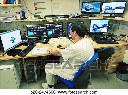Control screens, Linear Particle Accelerator, Radiotherapy, Treatment of cancer, Hospital Donostia, San Sebastian, Gipuzkoa, Basque Country, Spain View Large Photo Image Stock Photograph - Control screens, Linear Particle Accelerator, Radiotherapy, Treatment of cancer, Hospital Donostia, San Sebastian, Gipuzkoa, Basque Country, Spain. Fotosearch
