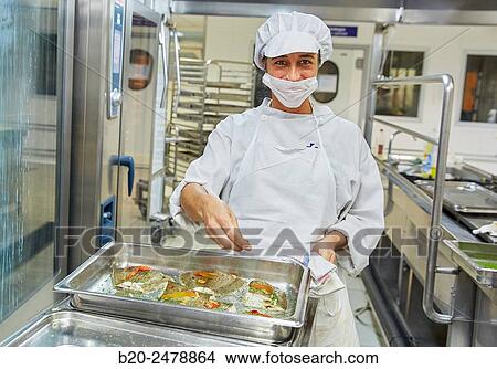 Cook preparing food, Hospital meal preparation, Kitchen, Hospital Donostia, San Sebastian, Gipuzkoa, Basque Country, Spain View Large Photo Image Picture - Cook preparing food, Hospital meal preparation, Kitchen, Hospital Donostia, San Sebastian, Gipuzkoa, Basque Country, Spain. Fotosearch