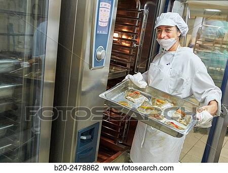 Cook preparing food, Hospital meal preparation, Kitchen, Hospital Donostia, San Sebastian, Gipuzkoa, Basque Country, Spain View Large Photo Image Stock Image - Cook preparing food, Hospital meal preparation, Kitchen, Hospital Donostia, San Sebastian, Gipuzkoa, Basque Country, Spain. Fotosearch