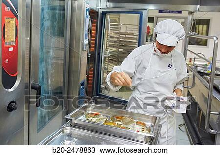 Cook preparing food, Hospital meal preparation, Kitchen, Hospital Donostia, San Sebastian, Gipuzkoa, Basque Country, Spain View Large Photo Image Stock Image - Cook preparing food, Hospital meal preparation, Kitchen, Hospital Donostia, San Sebastian, Gipuzkoa, Basque Country, Spain. Fotosearch