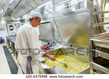 Cook preparing food, Hospital meal preparation, Kitchen, Hospital Donostia, San Sebastian, Gipuzkoa, Basque Country, Spain View Large Photo Image Stock Photo - Cook preparing food, Hospital meal preparation, Kitchen, Hospital Donostia, San Sebastian, Gipuzkoa, Basque Country, Spain. Fotosearch