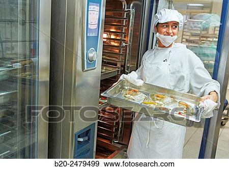 Cook preparing food, Hospital meal preparation, Kitchen, Hospital Donostia, San Sebastian, Gipuzkoa, Basque Country, Spain View Large Photo Image Stock Photo - Cook preparing food, Hospital meal preparation, Kitchen, Hospital Donostia, San Sebastian, Gipuzkoa, Basque Country, Spain. Fotosearch