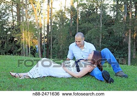 Couple expecting first baby View Large Photo Image Stock Photograph - Couple expecting first baby. Fotosearch