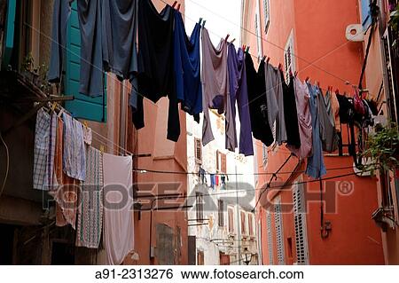 Croatia, Istria, historic city of Rovinj, small streets with drying linen View Large Photo Image Stock Photograph - Croatia, Istria, historic city of Rovinj, small streets with drying linen. Fotosearch