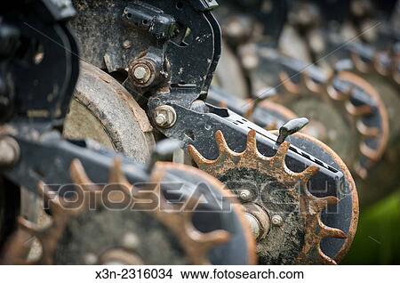 Picture - Detail of no till tractor closing wheels.. Fotosearch