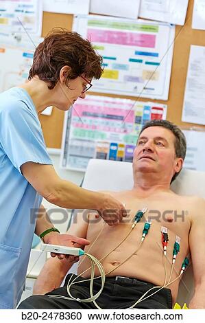 Electrocardiogram, Treatment room, Medical consultation, Ambulatory Lezo, Gipuzkoa, Basque Country, Spain View Large Photo Image Stock Image - Electrocardiogram, Treatment room, Medical consultation, Ambulatory Lezo, Gipuzkoa, Basque Country, Spain. Fotosearch