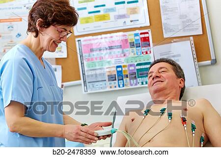 Electrocardiogram, Treatment room, Medical consultation, Ambulatory Lezo, Gipuzkoa, Basque Country, Spain View Large Photo Image Stock Photo - Electrocardiogram, Treatment room, Medical consultation, Ambulatory Lezo, Gipuzkoa, Basque Country, Spain. Fotosearch