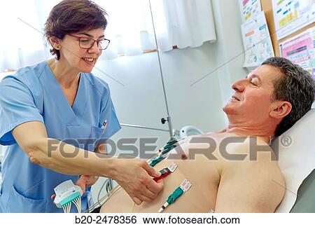 Electrocardiogram, Treatment room, Medical consultation, Ambulatory Lezo, Gipuzkoa, Basque Country, Spain View Large Photo Image Stock Photograph - Electrocardiogram, Treatment room, Medical consultation, Ambulatory Lezo, Gipuzkoa, Basque Country, Spain. Fotosearch