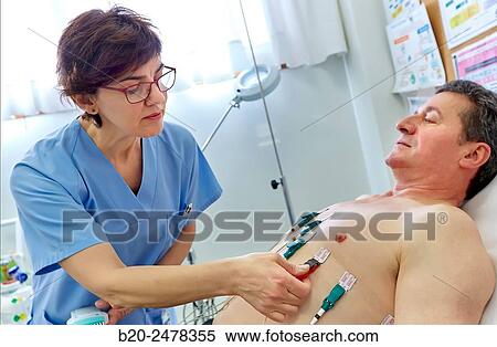 Electrocardiogram, Treatment room, Medical consultation, Ambulatory Lezo, Gipuzkoa, Basque Country, Spain View Large Photo Image Stock Photography - Electrocardiogram, Treatment room, Medical consultation, Ambulatory Lezo, Gipuzkoa, Basque Country, Spain. Fotosearch