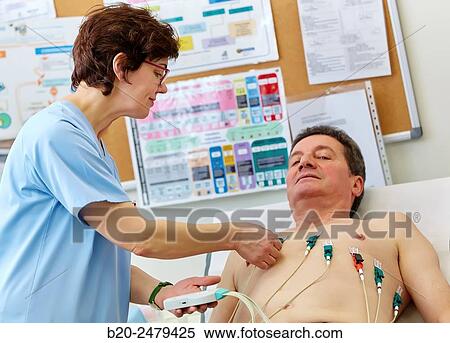Electrocardiogram, Treatment room, Medical consultation, Ambulatory Lezo, Gipuzkoa, Basque Country, Spain View Large Photo Image Stock Photography - Electrocardiogram, Treatment room, Medical consultation, Ambulatory Lezo, Gipuzkoa, Basque Country, Spain. Fotosearch