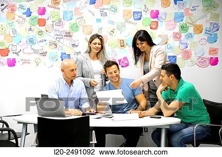 Executives at meeting table. Office. Coworking. View Large Photo Image Stock Image - Executives at meeting table. Office. Coworking.. Fotosearch