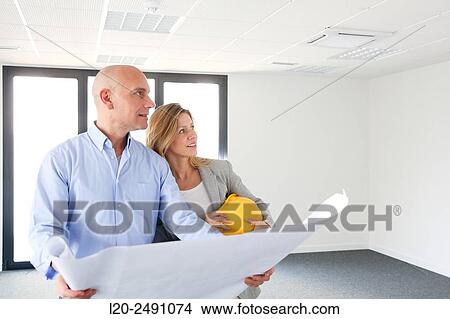 Picture - Executives. Site plan. Empty office building.. Fotosearch