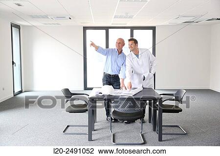 Executives. Site plan. Meeting room. Office building. View Large Photo Image Stock Image - Executives. Site plan. Meeting room. Office building.. Fotosearch