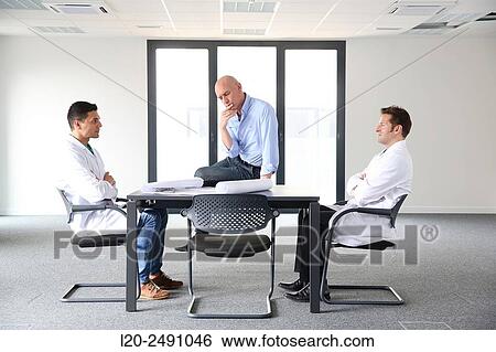 Executives. Site plan. Meeting room. Office building. View Large Photo Image Stock Photograph - Executives. Site plan. Meeting room. Office building.. Fotosearch