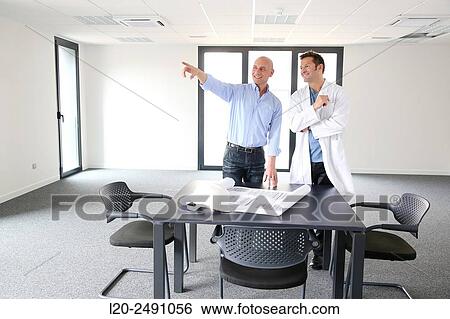 Executives. Site plan. Meeting room. Office building. View Large Photo Image Stock Photograph - Executives. Site plan. Meeting room. Office building.. Fotosearch