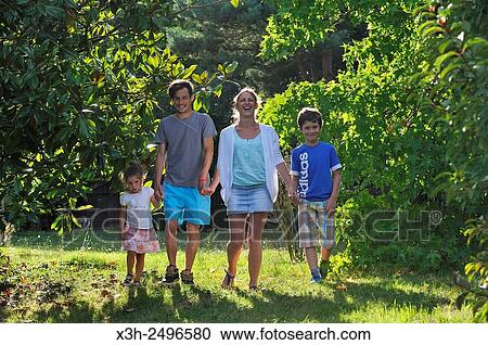 family walking in a garden, Ile-de-France region, France, Europe. View Large Photo Image Stock Image - family walking in a garden, Ile-de-France region, France, Europe.. Fotosearch