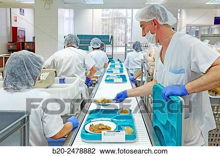 Stock Image - Food serving line, Hospital meal preparation, Kitchen, Hospital Donostia, San Sebastian, Gipuzkoa, Basque Country, Spain. Fotosearch