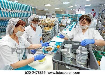 Stock Photograph - Food serving line, Hospital meal preparation, Kitchen, Hospital Donostia, San Sebastian, Gipuzkoa, Basque Country, Spain. Fotosearch