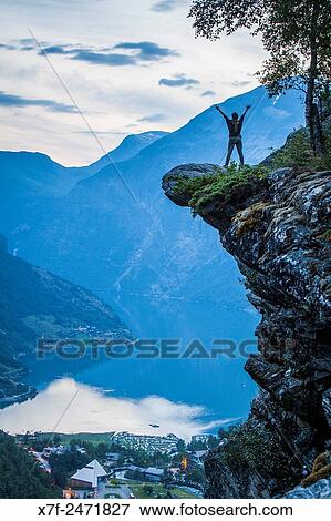 Geiranger and Geirangerfjord from Flydalsjuvet gorge, More og Romsdal, Norway. View Large Photo Image Stock Photo - Geiranger and Geirangerfjord from Flydalsjuvet gorge, More og Romsdal, Norway.. Fotosearch