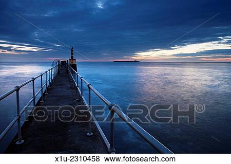 Harbour Light and Coquet Island Amble by the Sea Northumberland Coast England. View Large Photo Image Stock Photo - Harbour Light and Coquet Island Amble by the Sea Northumberland Coast England.. Fotosearch