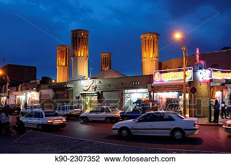 Stock Image - Historic windtowers on local buildings on Amir Chakmaq Square, Yazd, Iran, Asia.. Fotosearch