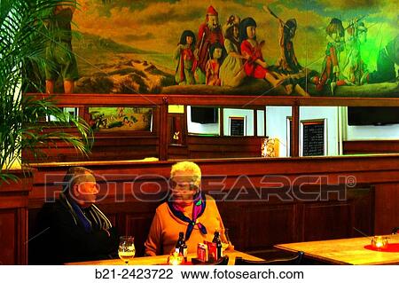 Stock Image - In an old tavern at Antwerp, Belgium. Fotosearch