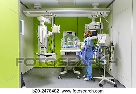 Stock Image - Incubator, Medical care, Neonate Intensive care Unit, ICU, Hospital Donostia, San Sebastian, Gipuzkoa, Basque Country, Spain. Fotosearch