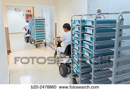 Internal transportation of food in motorcars, Kitchen, Hospital Donostia, San Sebastian, Gipuzkoa, Basque Country, Spain View Large Photo Image Stock Image - Internal transportation of food in motorcars, Kitchen, Hospital Donostia, San Sebastian, Gipuzkoa, Basque Country, Spain. Fotosearch