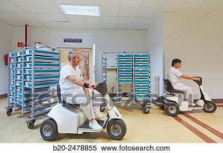 Internal transportation of food in motorcars, Kitchen, Hospital Donostia, San Sebastian, Gipuzkoa, Basque Country, Spain View Large Photo Image Stock Photography - Internal transportation of food in motorcars, Kitchen, Hospital Donostia, San Sebastian, Gipuzkoa, Basque Country, Spain. Fotosearch