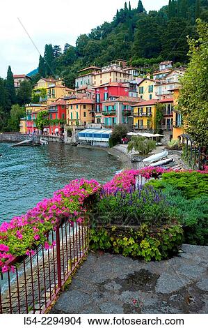 Italy, Lombardy, Lake Como, Varenna, View of waterfront at lake View Large Photo Image Picture - Italy, Lombardy, Lake Como, Varenna, View of waterfront at lake. Fotosearch