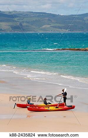 Kayak lesson on a beach in Apollo Bay. Great Ocean Road, Victoria, Australia. View Large Photo Image Picture - Kayak lesson on a beach in Apollo Bay. Great Ocean Road, Victoria, Australia.. Fotosearch