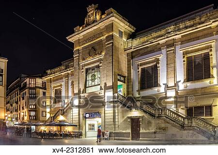 Stock Image - La Bretxa Market. Old town of San Sebastián by night. Donostia, Basque Country, Spain.. Fotosearch